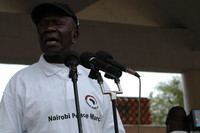 The vice president of Kenya Hon. Moody Awori, addressing the participants of the peace march