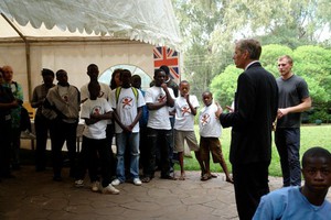 UK High Commissioner Rob Macaire, Artist David Fulford and the children 