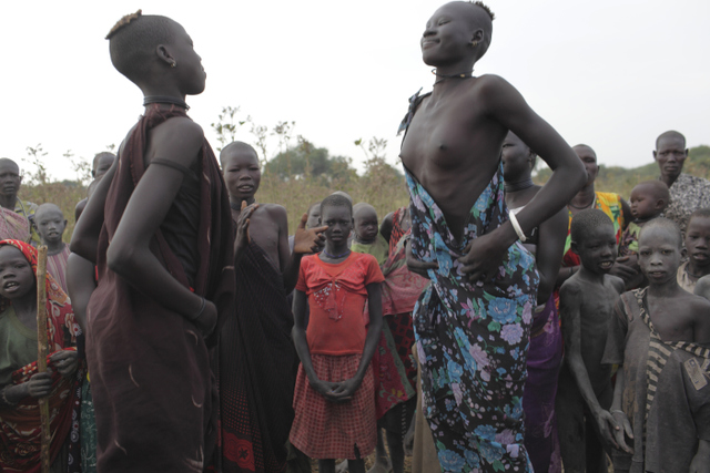 Wathaguar. Girls dance in the cattle camp.