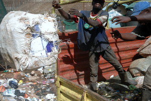 Riruta environmental group offloading garbage